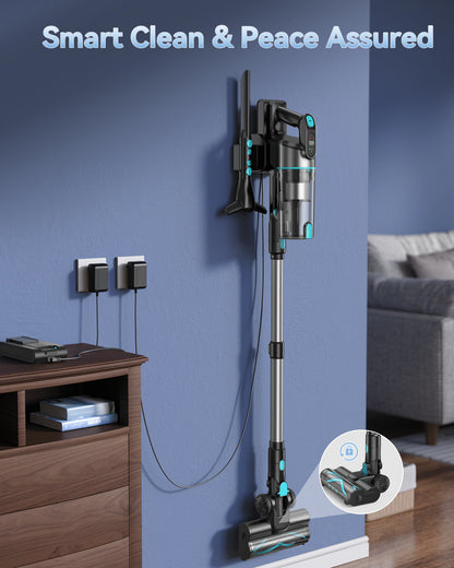 A cordless stick vacuum cleaner with a metallic silver body and teal accents is mounted vertically on a blue wall in a living room setting. The image includes the text 'Smart Clean & Peace Assured' at the top and a circular inset showing the vacuum folded flat.